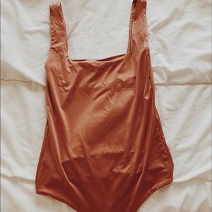 Laura’s boutique choral bodysuit